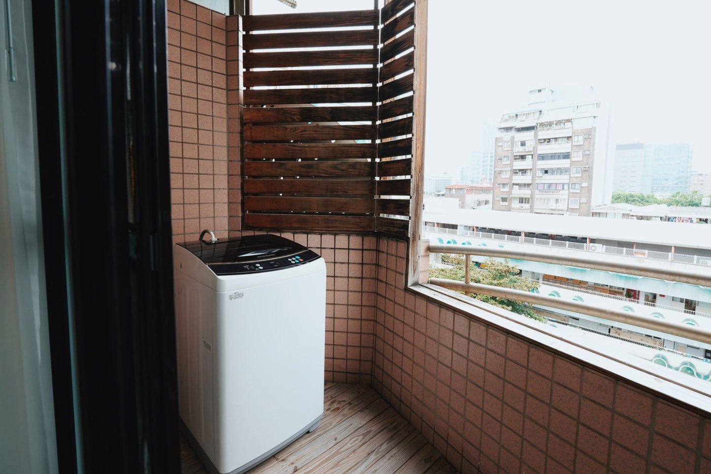 In-unit laundry with washer and dryer in Taipei Taiwan short-term apartment for convenience - Kolette Home