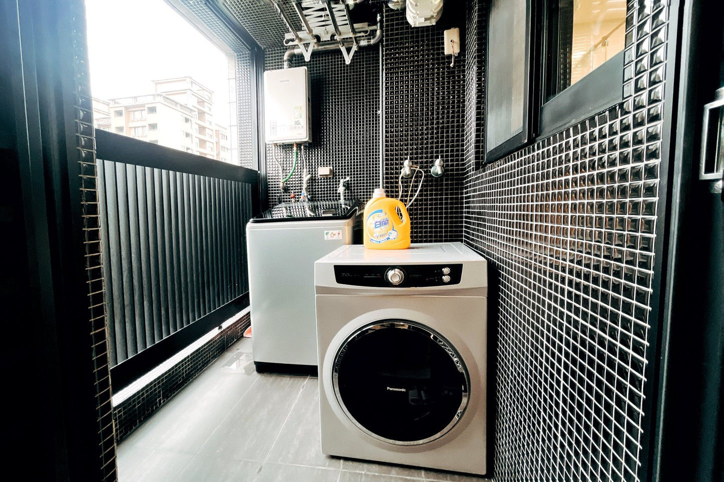 In-unit laundry with washer and dryer in Taipei Taiwan short-term apartment for convenience - Kolette Home