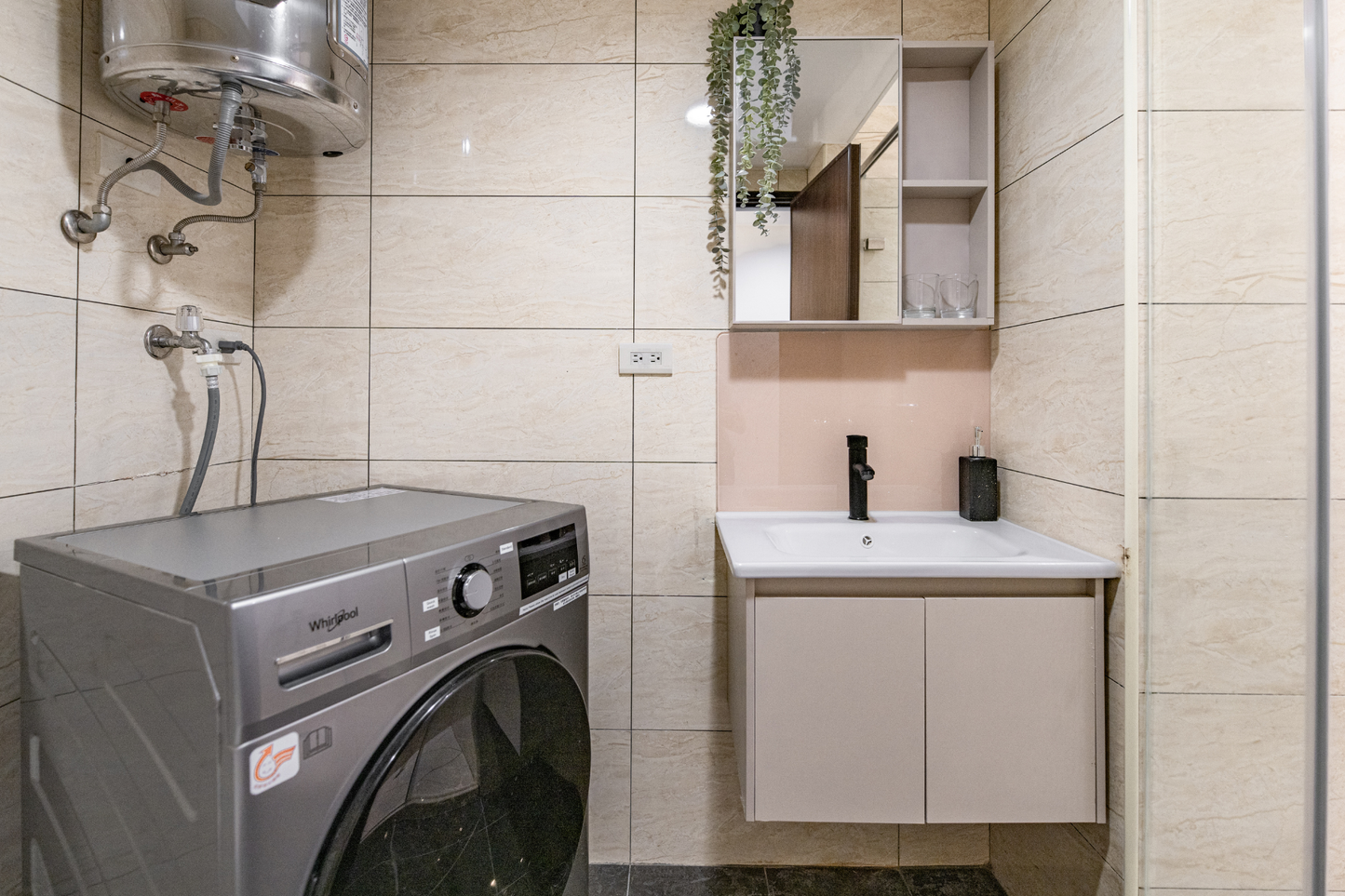In-unit laundry with washer and dryer in Taipei Taiwan short-term apartment for convenience - Kolette Home