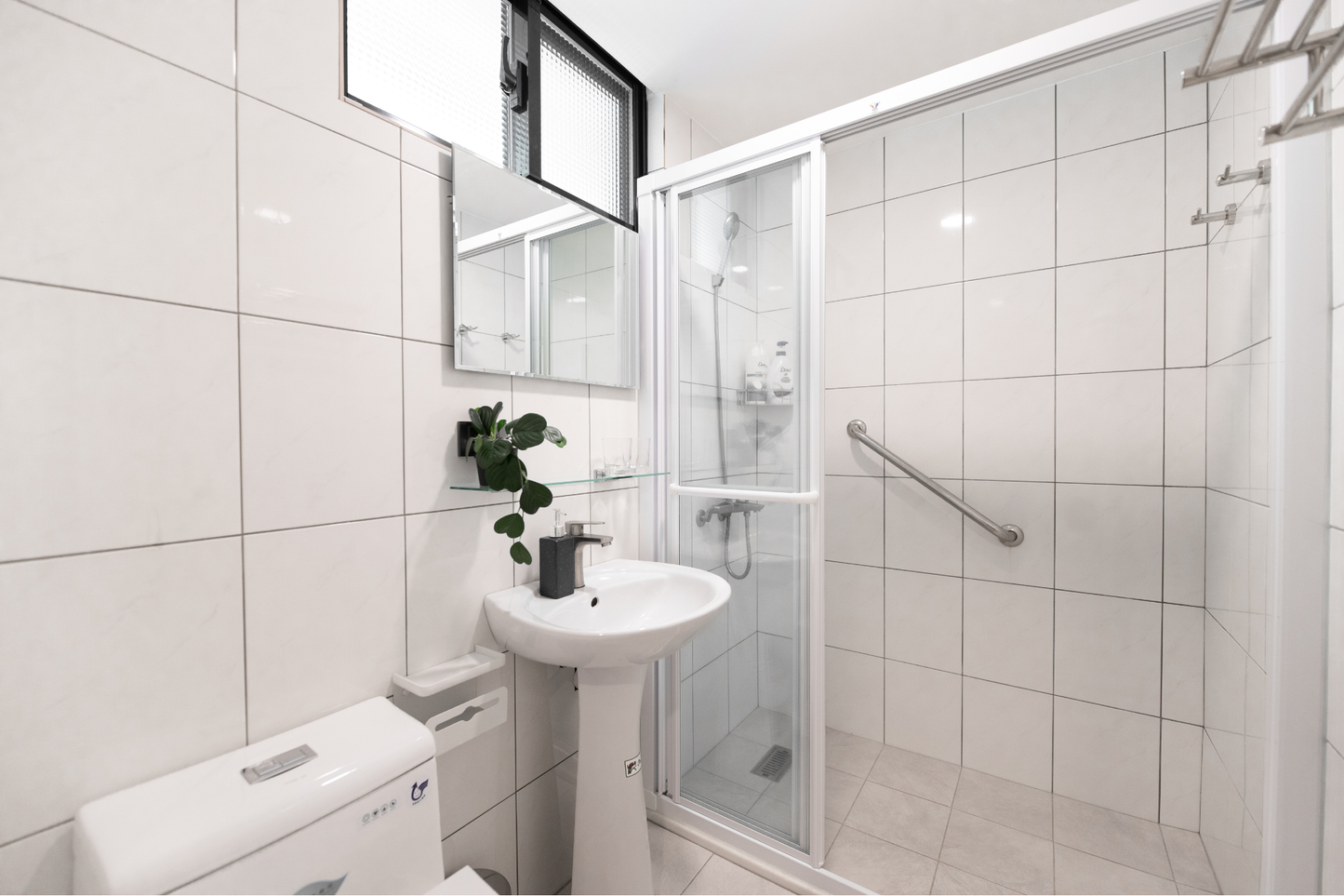 Clean hotel-grade bathroom in Taipei Taiwan short-term rental with shower - Kolette Home