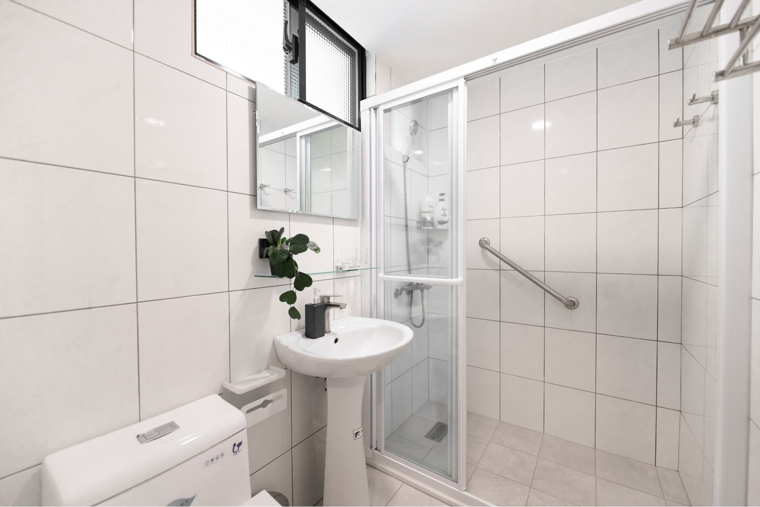 Clean hotel-grade bathroom in Taipei Taiwan short-term rental with shower - Kolette Home