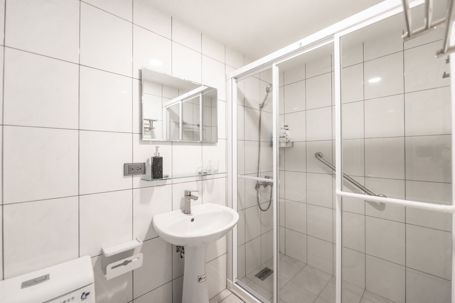 Clean hotel-grade bathroom in Taipei Taiwan short-term rental with shower - Kolette Home