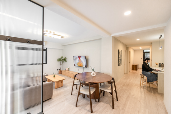 Modern living room in Taipei Taiwan short-term apartment with minimalist design - Kolette Home