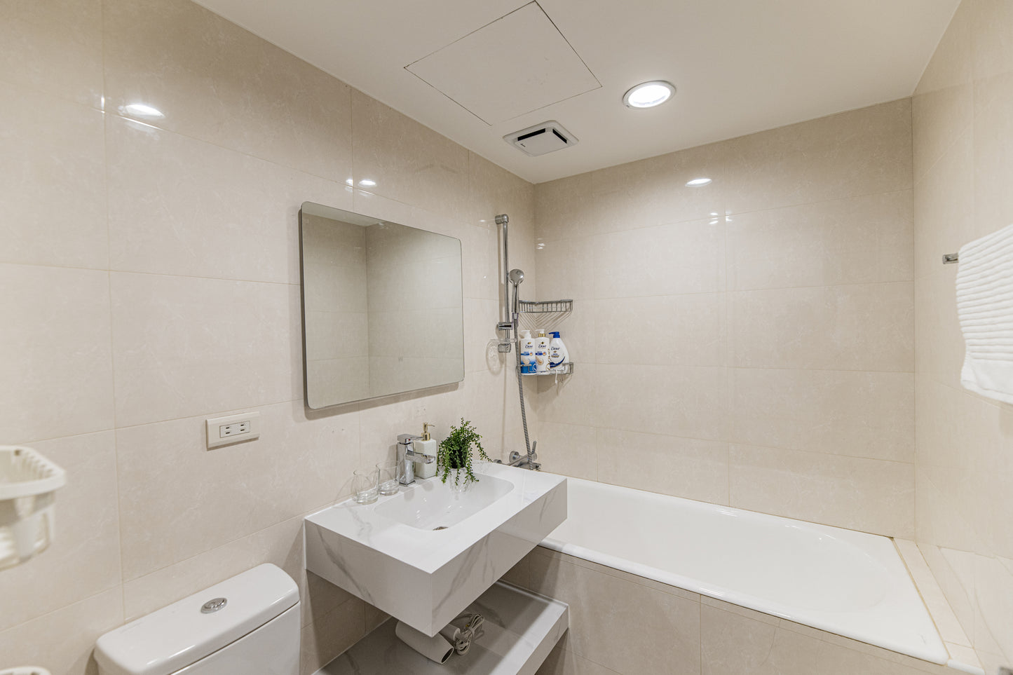 Clean hotel-grade bathroom in Taipei Taiwan short-term rental with bathtub - Kolette Home