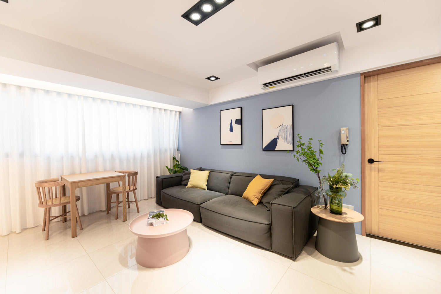 Modern living room in Taipei Taiwan short-term apartment with minimalist design - Kolette Home