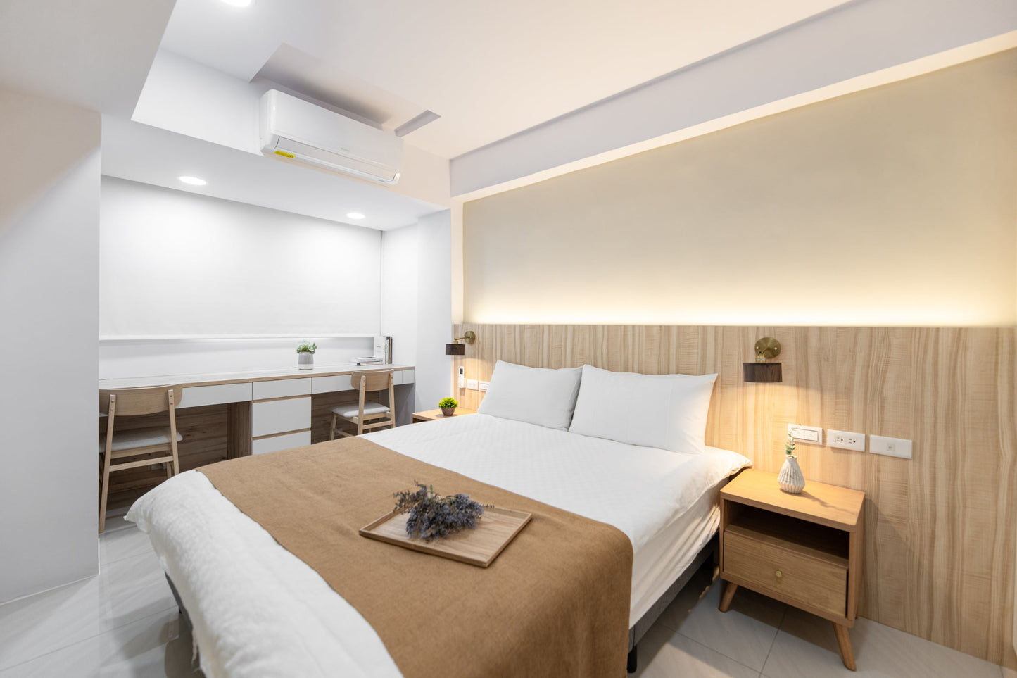 Modern living room in Taipei Taiwan short-term apartment with minimalist design - Kolette Home
