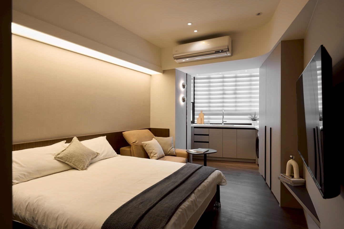 Quiet Kolette Home bedroom with premium bedding and blackout curtains for a restful night in the city.