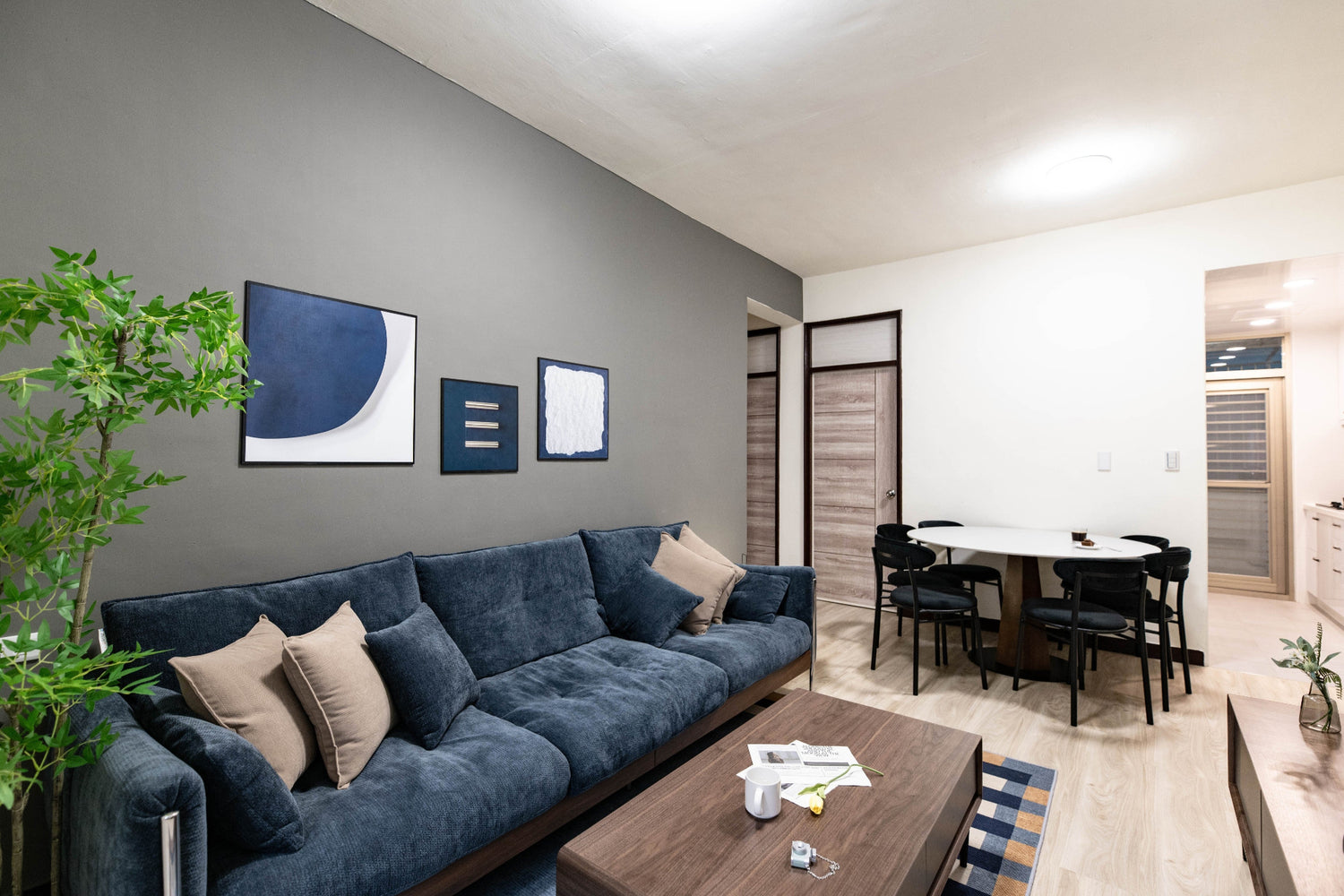 Modern living room in Taipei Taiwan short-term apartment with minimalist design - Kolette Home
