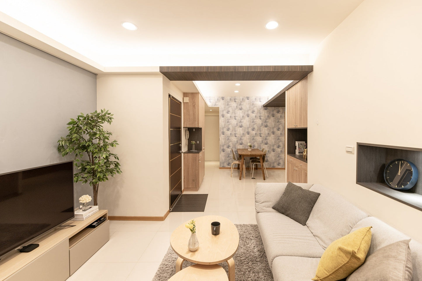 Modern living room in Taipei Taiwan short-term apartment with minimalist design - Kolette Home