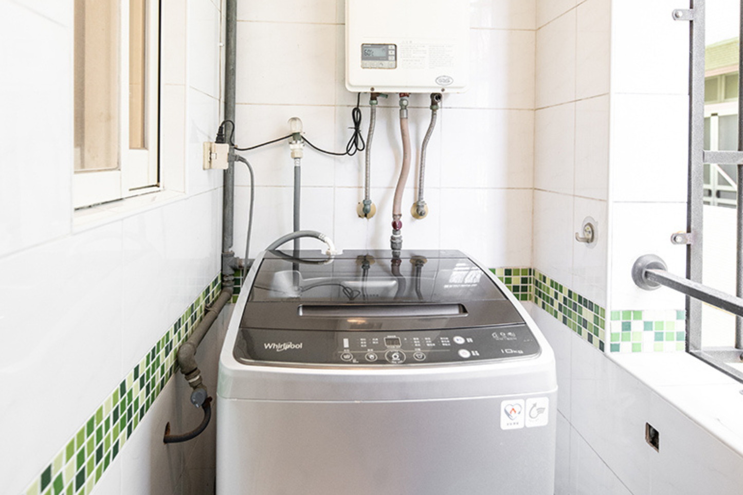 In-unit laundry with washer and dryer in Taipei Taiwan short-term apartment for convenience - Kolette Home