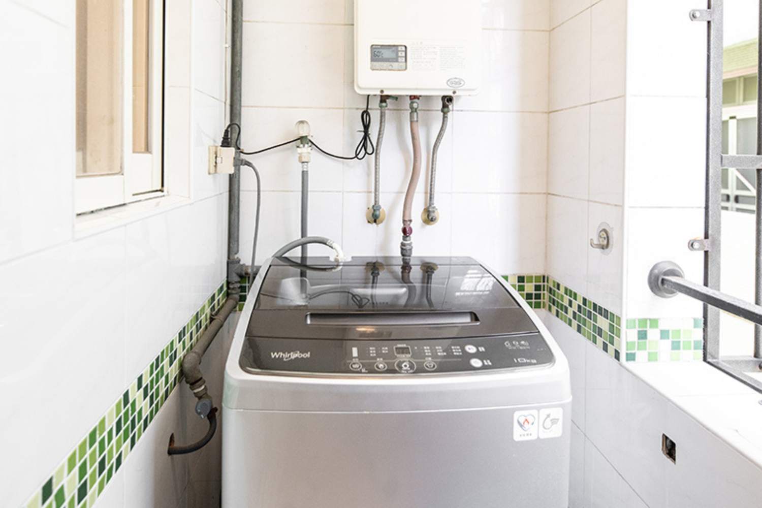 In-unit laundry with washer and dryer in Taipei Taiwan short-term apartment for convenience - Kolette Home