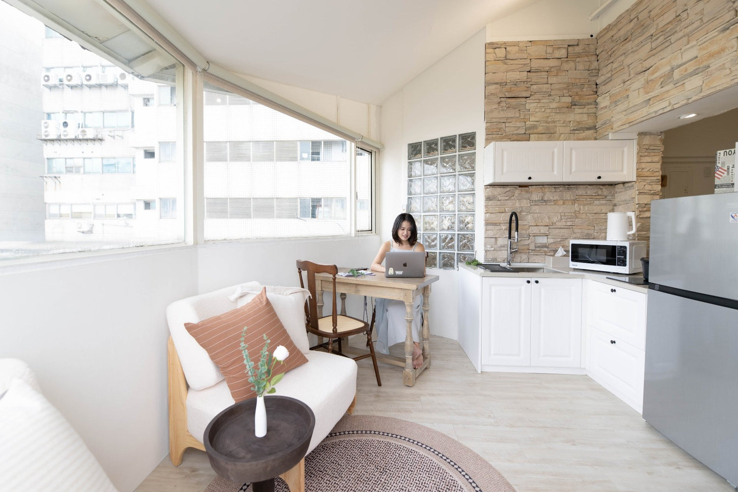 Modern living room in Taipei Taiwan short-term apartment with minimalist design - Kolette Home