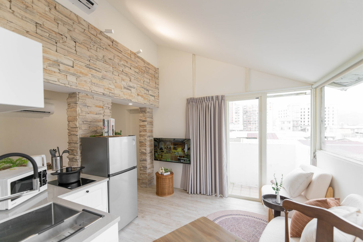 Modern living room in Taipei Taiwan short-term apartment with minimalist design - Kolette Home