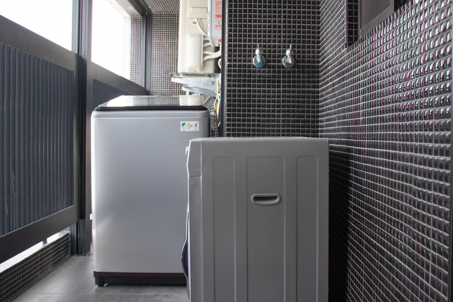 In-unit laundry with washer and dryer in Taipei Taiwan short-term apartment for convenience - Kolette Home
