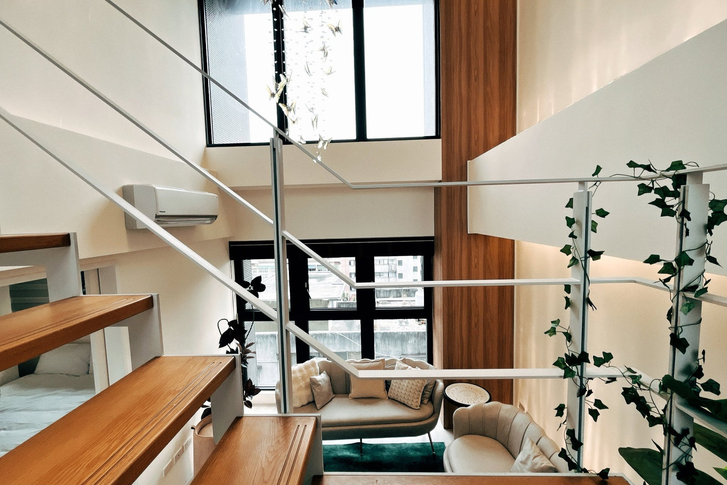 Modern living room in Taipei Taiwan short-term apartment with minimalist design - Kolette Home