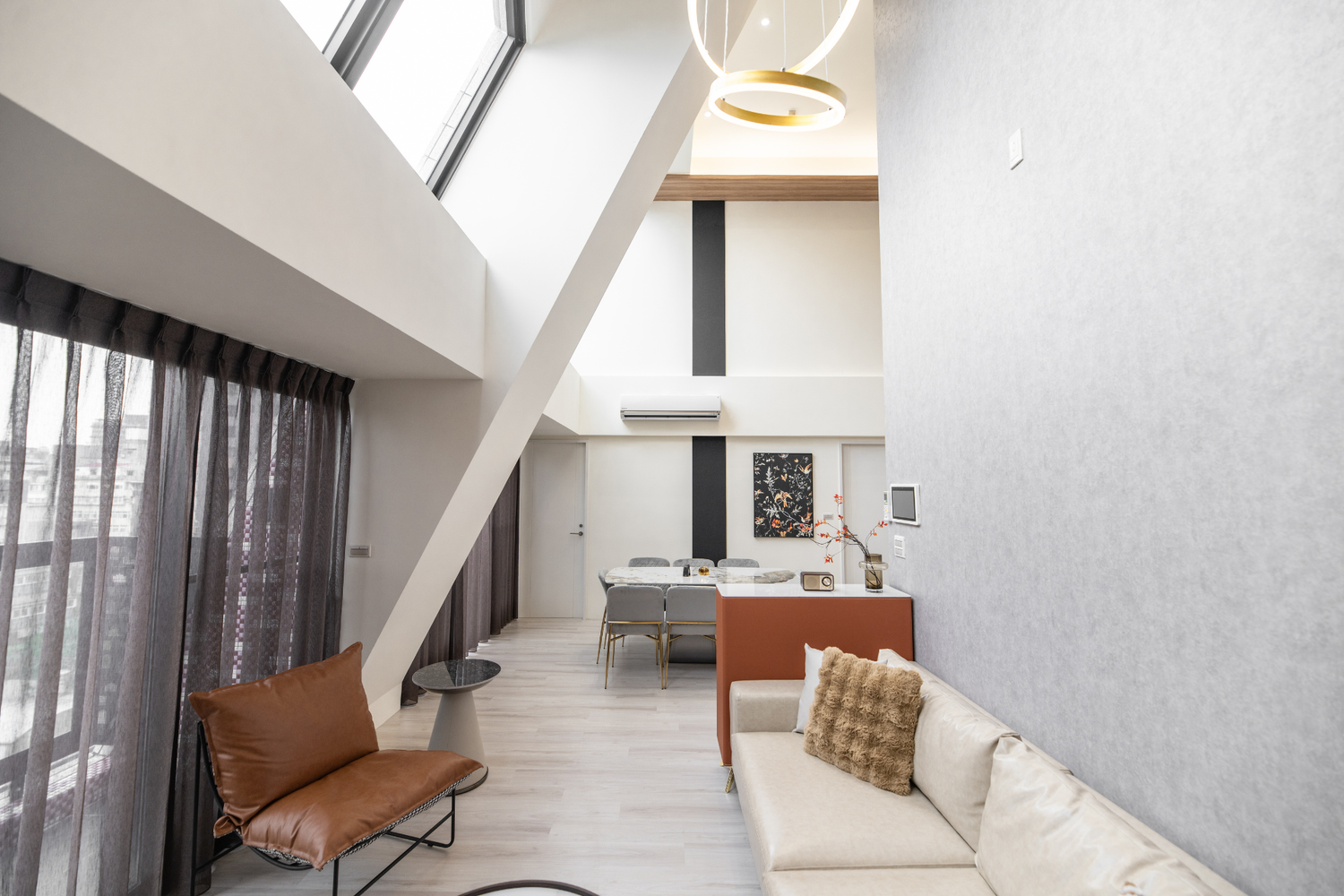 Modern living room in Taipei Taiwan short-term apartment with minimalist design - Kolette Home