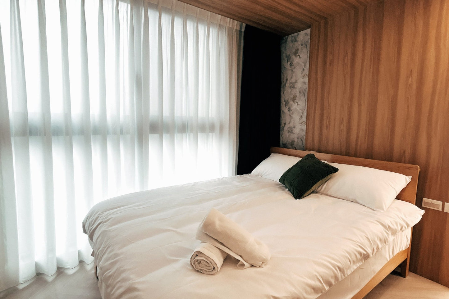 Cozy bedroom in Taipei Taiwan monthly apartment with premium bedding and quiet atmosphere - Kolette Home