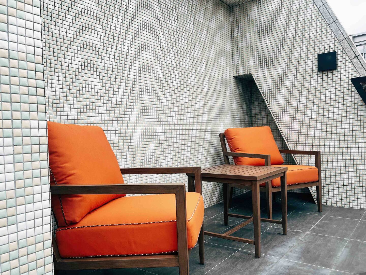 Private balcony with city view in Taipei Taiwan serviced apartment, perfect for morning coffee - Kolette Home