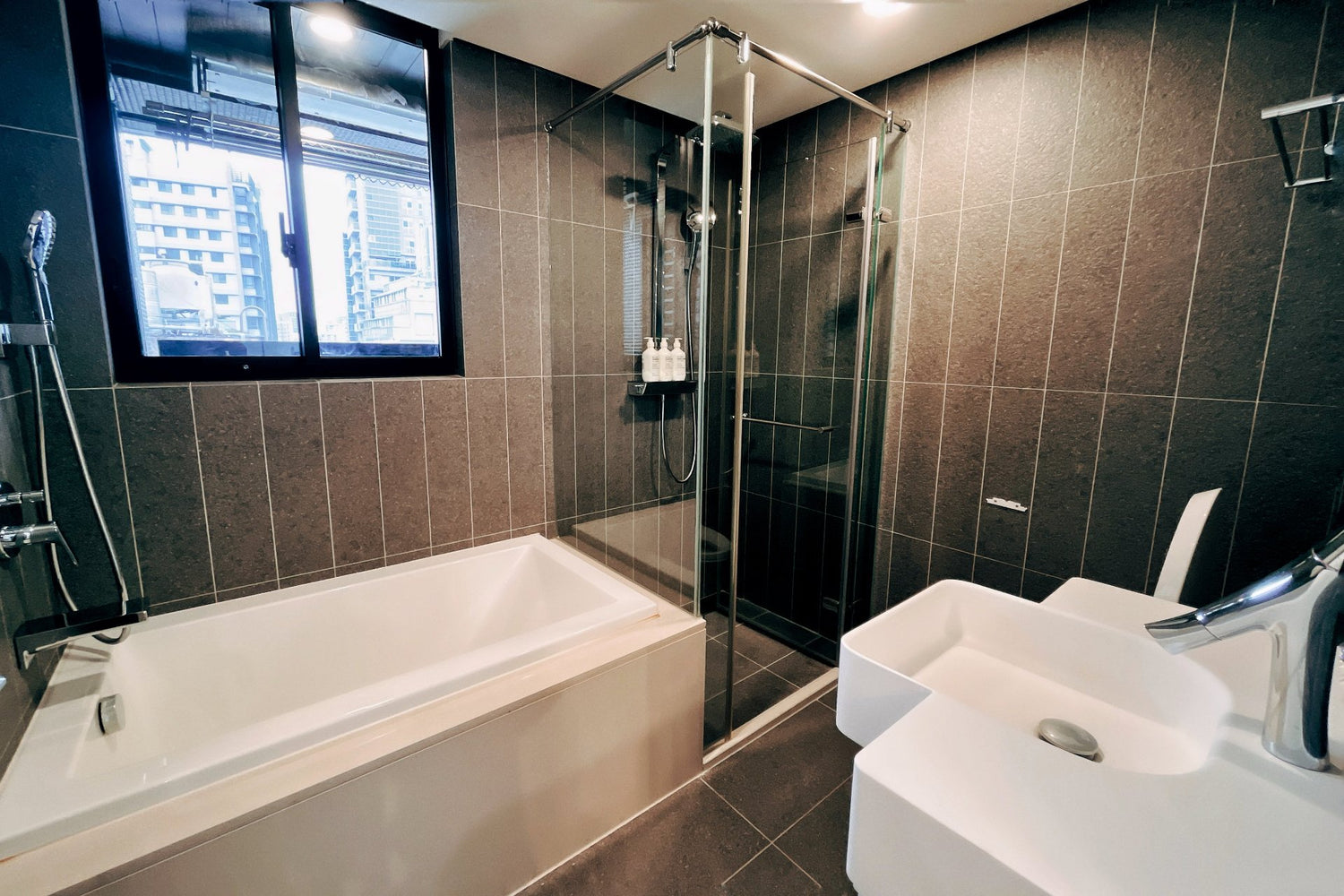 Clean hotel-grade bathroom in Taipei Taiwan short-term rental with shower and bathtub- Kolette Home