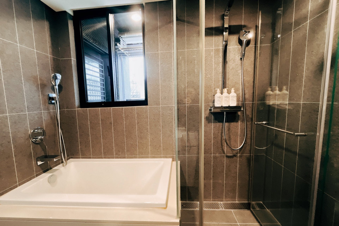 Clean hotel-grade bathroom in Taipei Taiwan short-term rental with shower and bathtub- Kolette Home