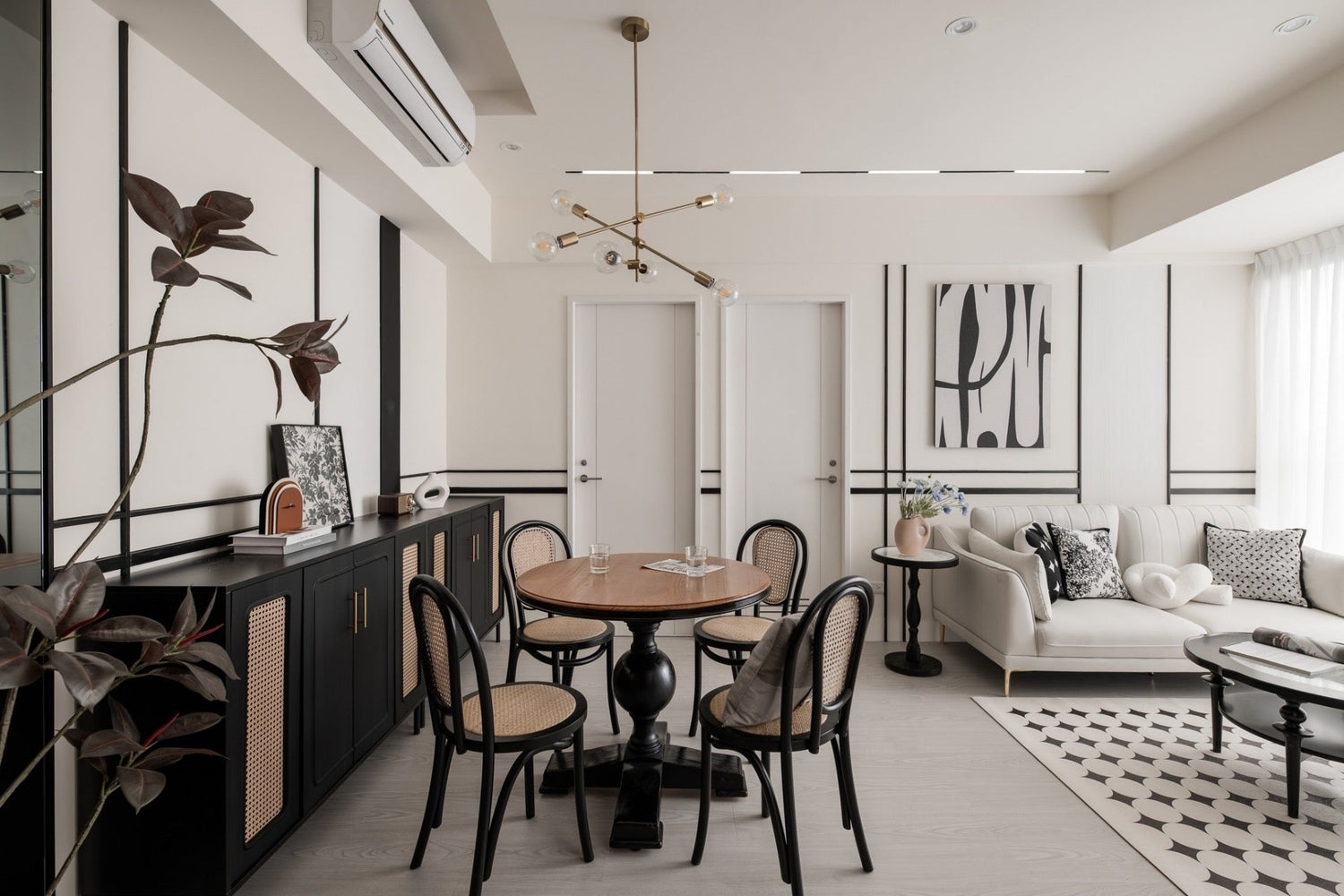 Modern living room in Taipei Taiwan short-term apartment with minimalist design - Kolette Home