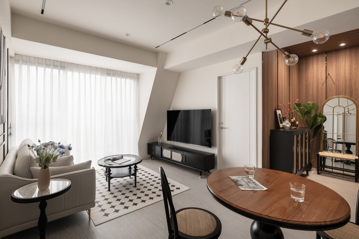 Modern living room in Taipei Taiwan short-term apartment with minimalist design - Kolette Home