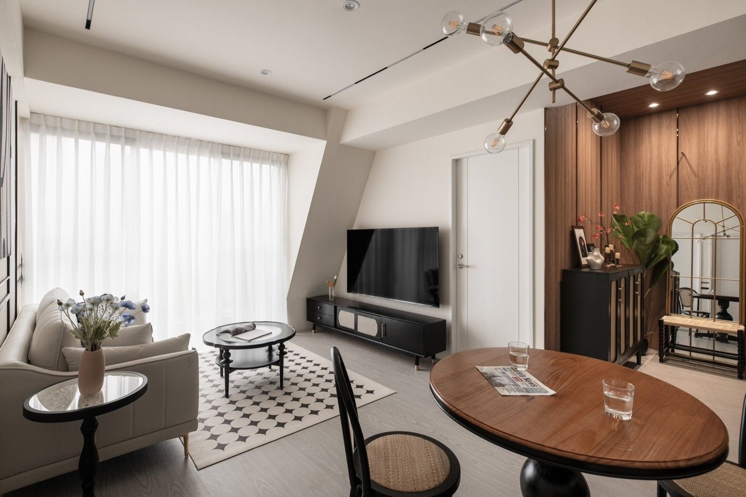 Modern living room in Taipei Taiwan short-term apartment with minimalist design - Kolette Home