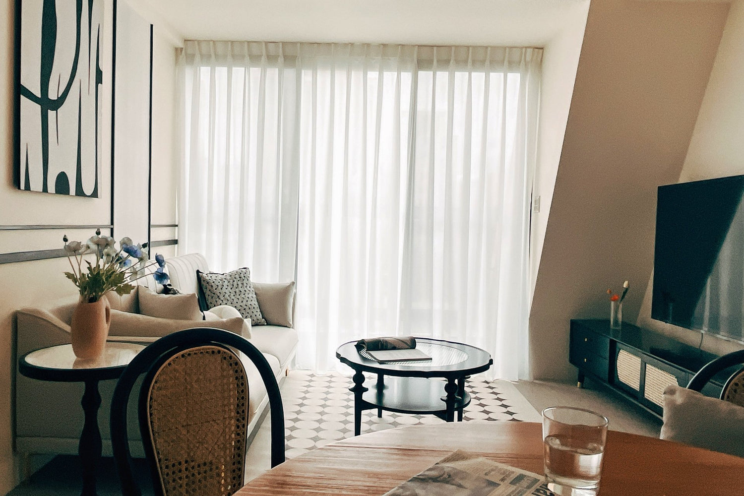 Modern living room in Taipei Taiwan short-term apartment with minimalist design - Kolette Home