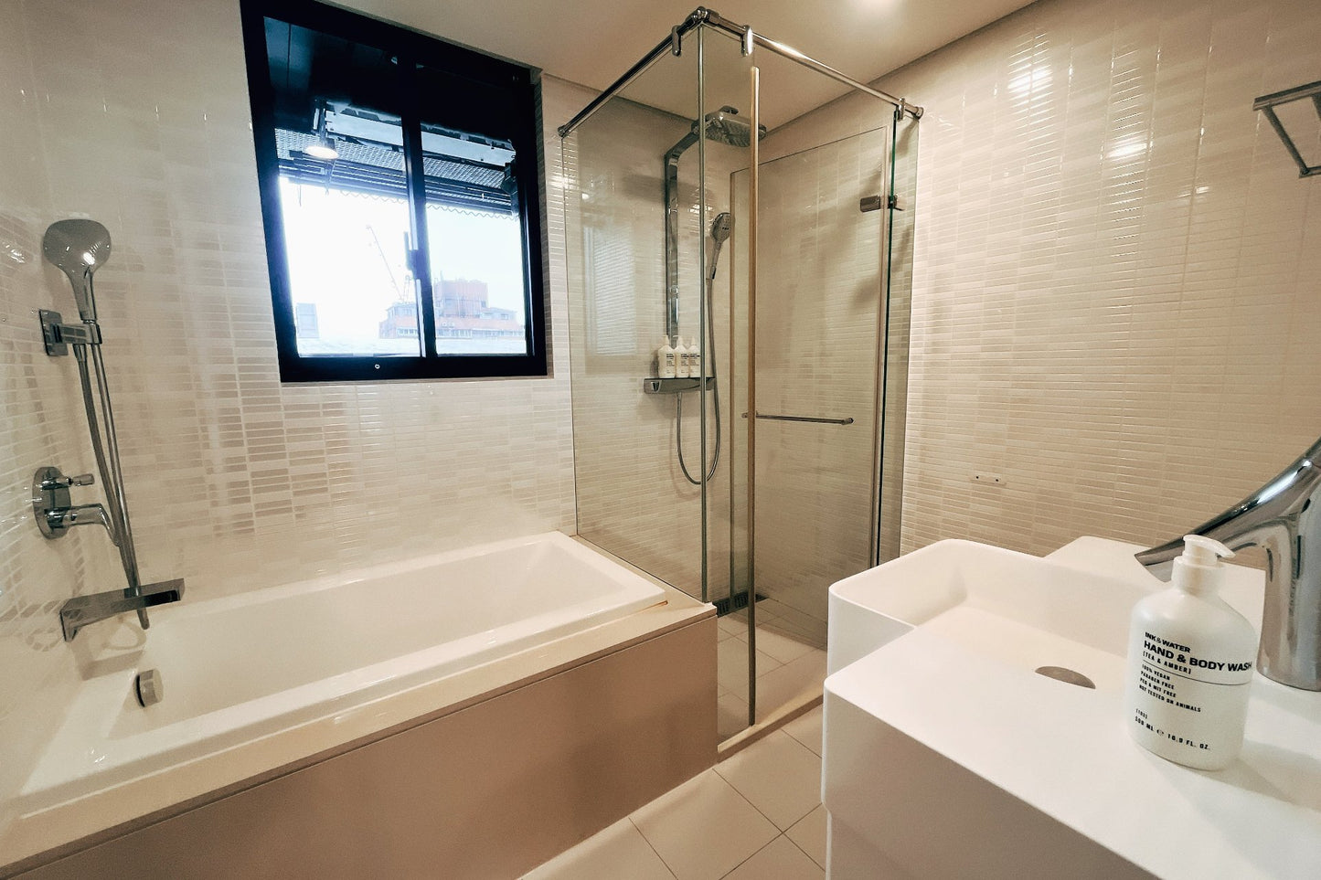 Clean hotel-grade bathroom in Taipei Taiwan short-term rental with shower and bathtub - Kolette Home