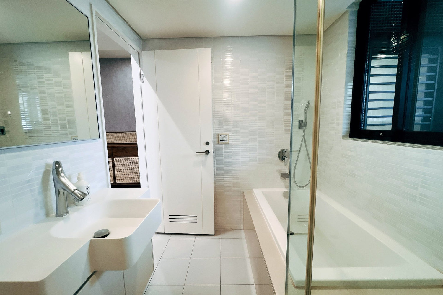 Clean hotel-grade bathroom in Taipei Taiwan short-term rental with shower and bathtub- Kolette Home