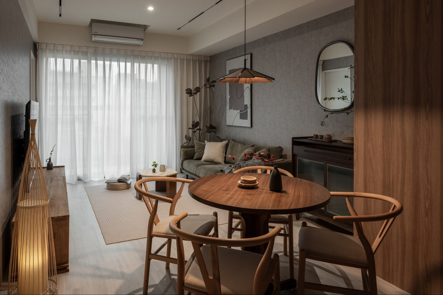 Modern living room in Taipei Taiwan short-term apartment with minimalist design - Kolette Home