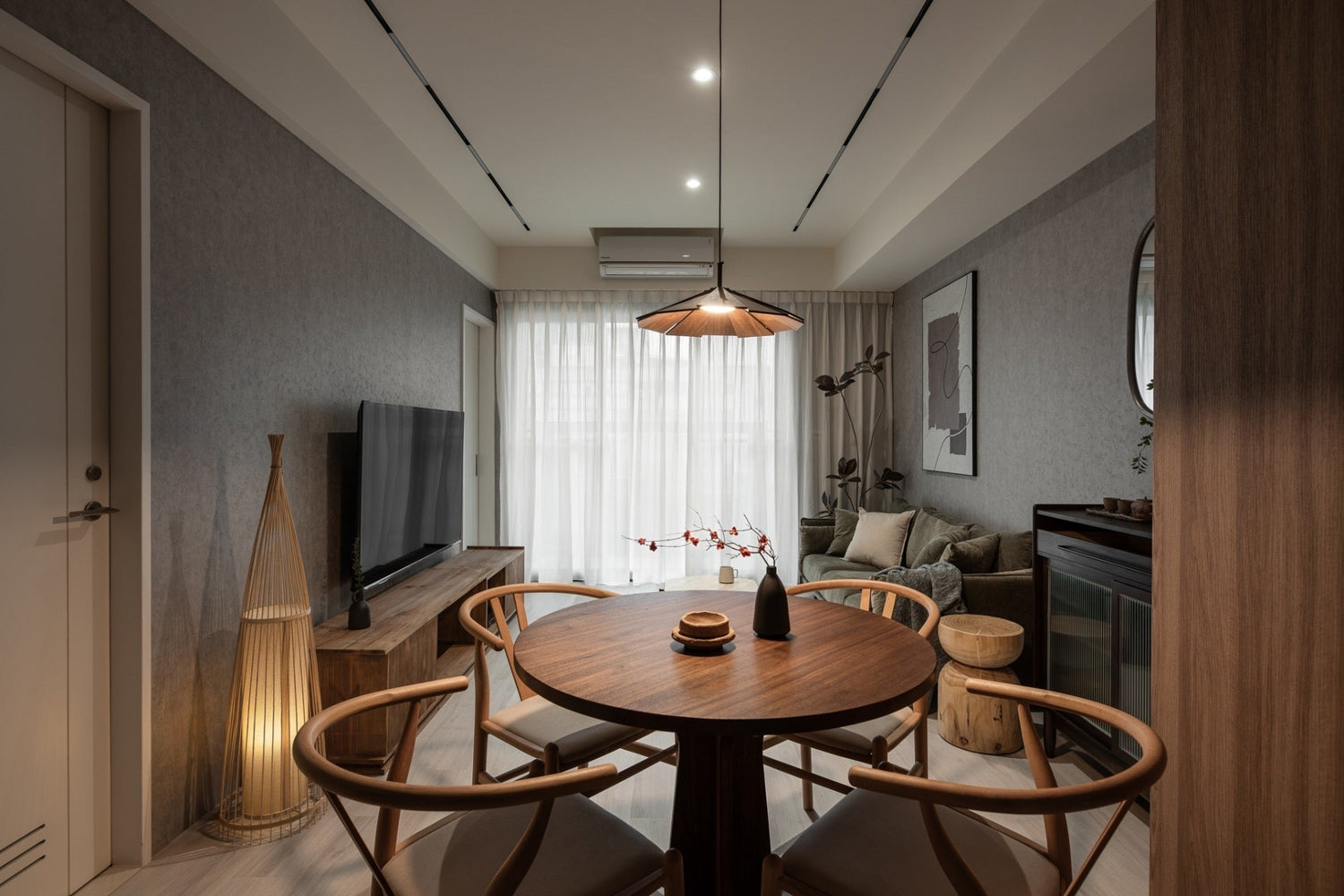 Modern living room in Taipei Taiwan short-term apartment with minimalist design - Kolette Home