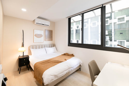 Cozy bedroom in Taipei Taiwan monthly apartment with premium bedding and quiet atmosphere - Kolette Home