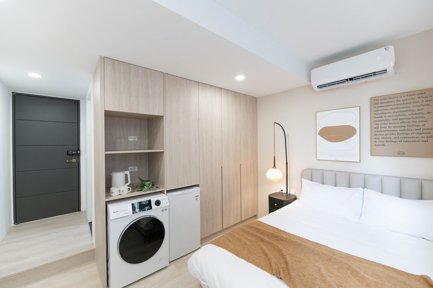 In-unit laundry with washer and dryer in Taipei Taiwan short-term apartment for convenience - Kolette Home