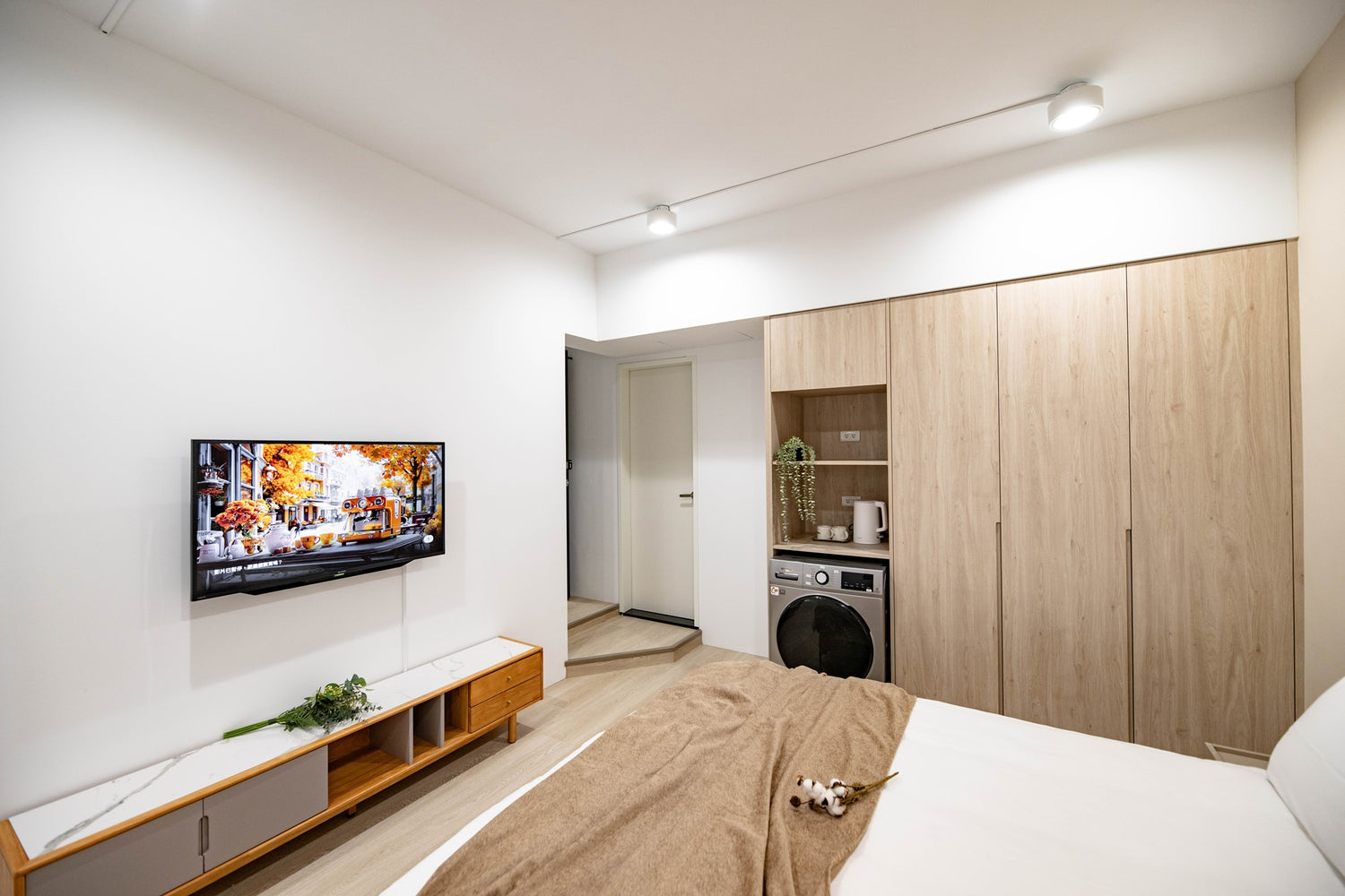 In-unit laundry with washer and dryer in Taipei Taiwan short-term apartment for convenience - Kolette Home