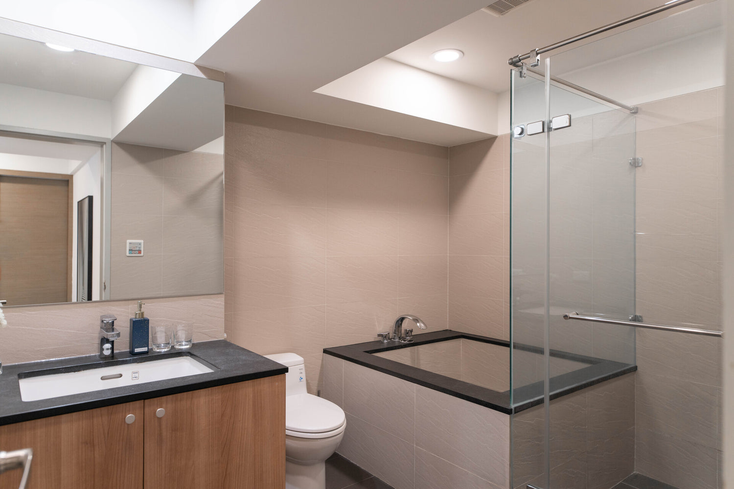 Clean hotel-grade bathroom in Taipei Taiwan short-term rental with shower and bathtub - Kolette Home