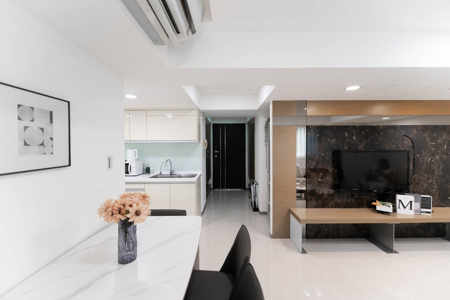 Modern living room in Taipei Taiwan short-term apartment with minimalist design - Kolette Home