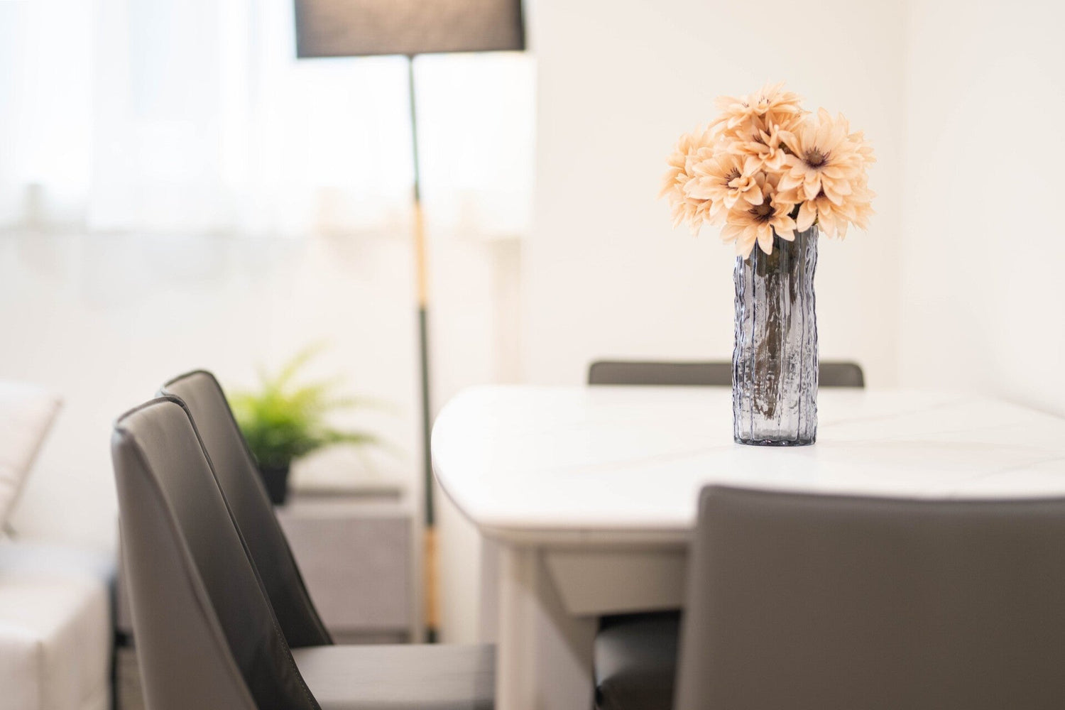 Modern dining table in Taipei Taiwan short-term apartment with minimalist design - Kolette Home