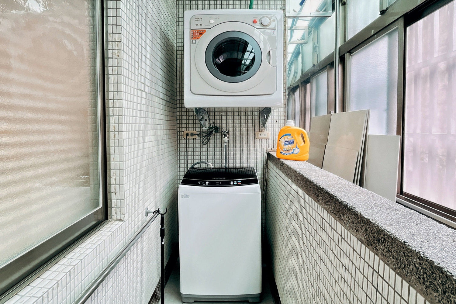 In-unit laundry with washer and dryer in Taipei Taiwan short-term apartment for convenience - Kolette Home