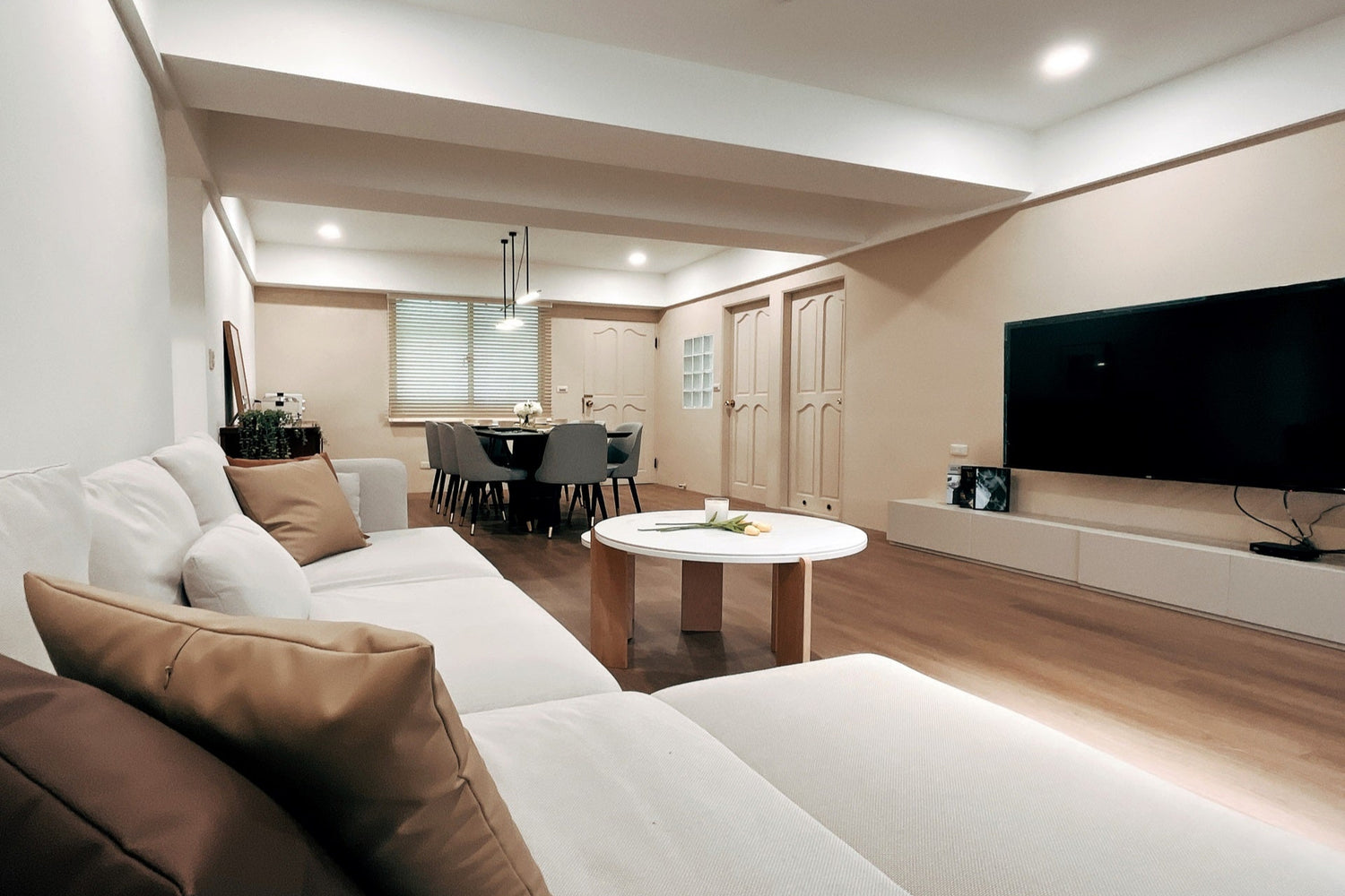 Modern living room in Taipei Taiwan short-term apartment with minimalist design - Kolette Home