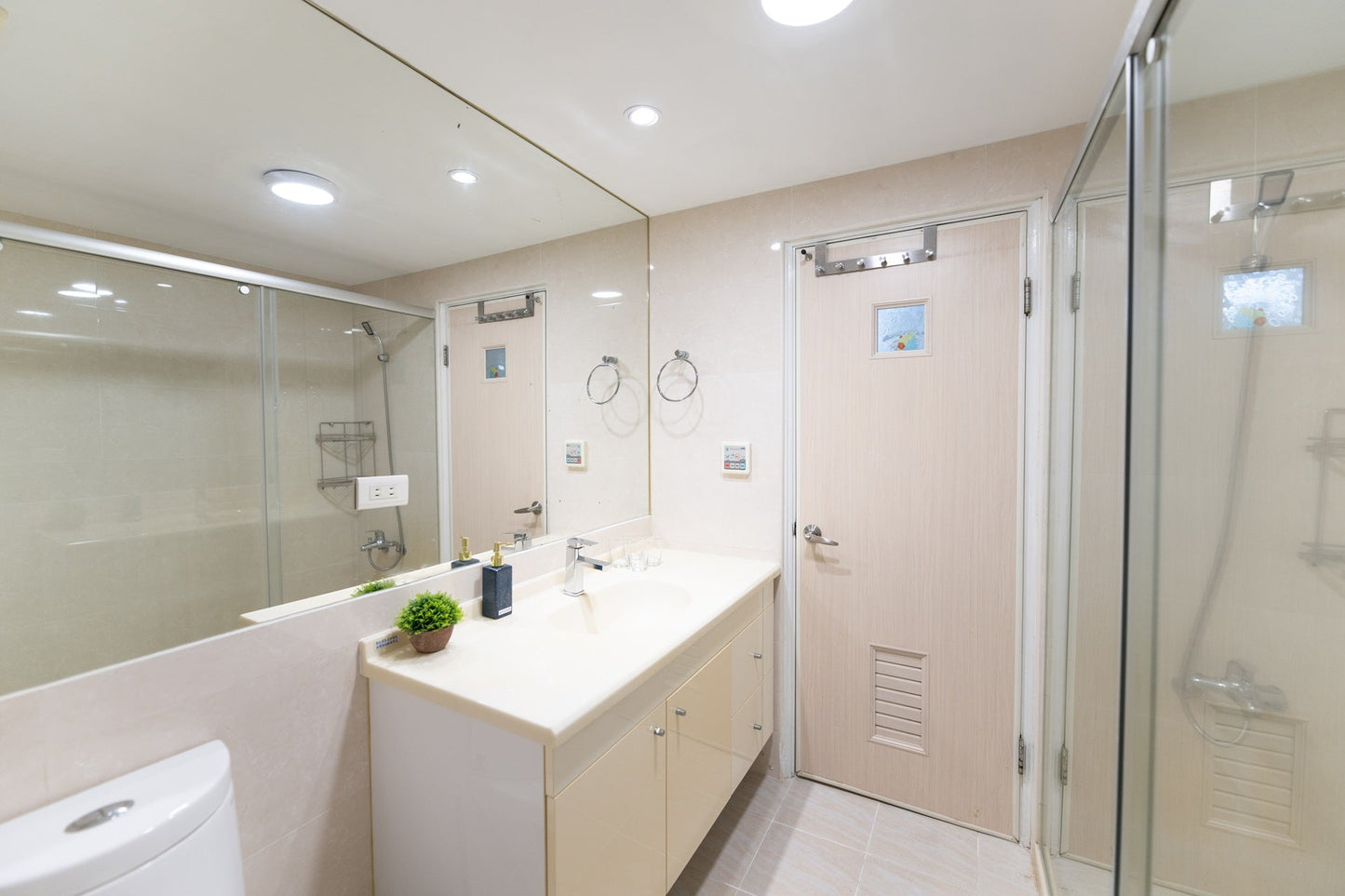 Clean hotel-grade bathroom in Taipei Taiwan short-term rental with shower - Kolette Home
