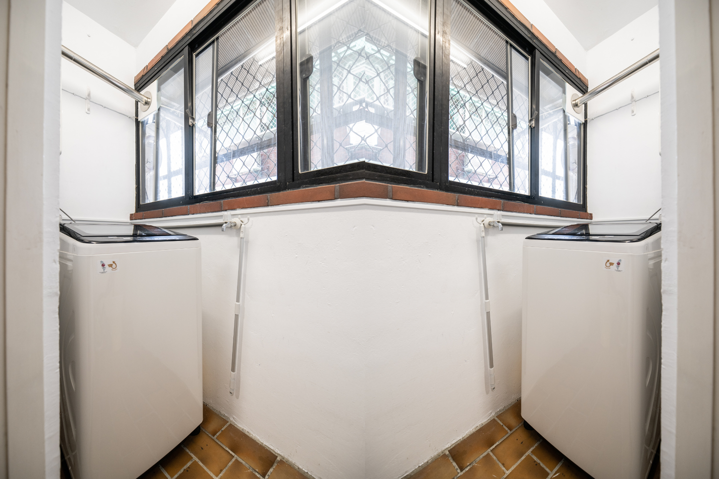 In-unit laundry with washer in Taipei Taiwan short-term apartment for convenience - Kolette Hom