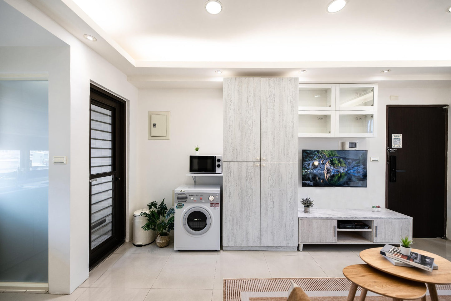 In-unit laundry with washer and dryer in Taipei Taiwan short-term apartment for convenience - Kolette Home