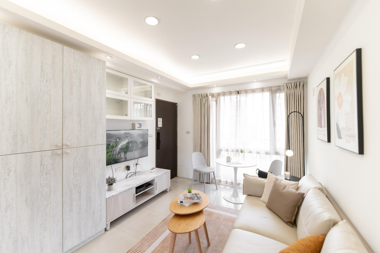 Modern living room in Taipei Taiwan short-term apartment with minimalist design - Kolette Home