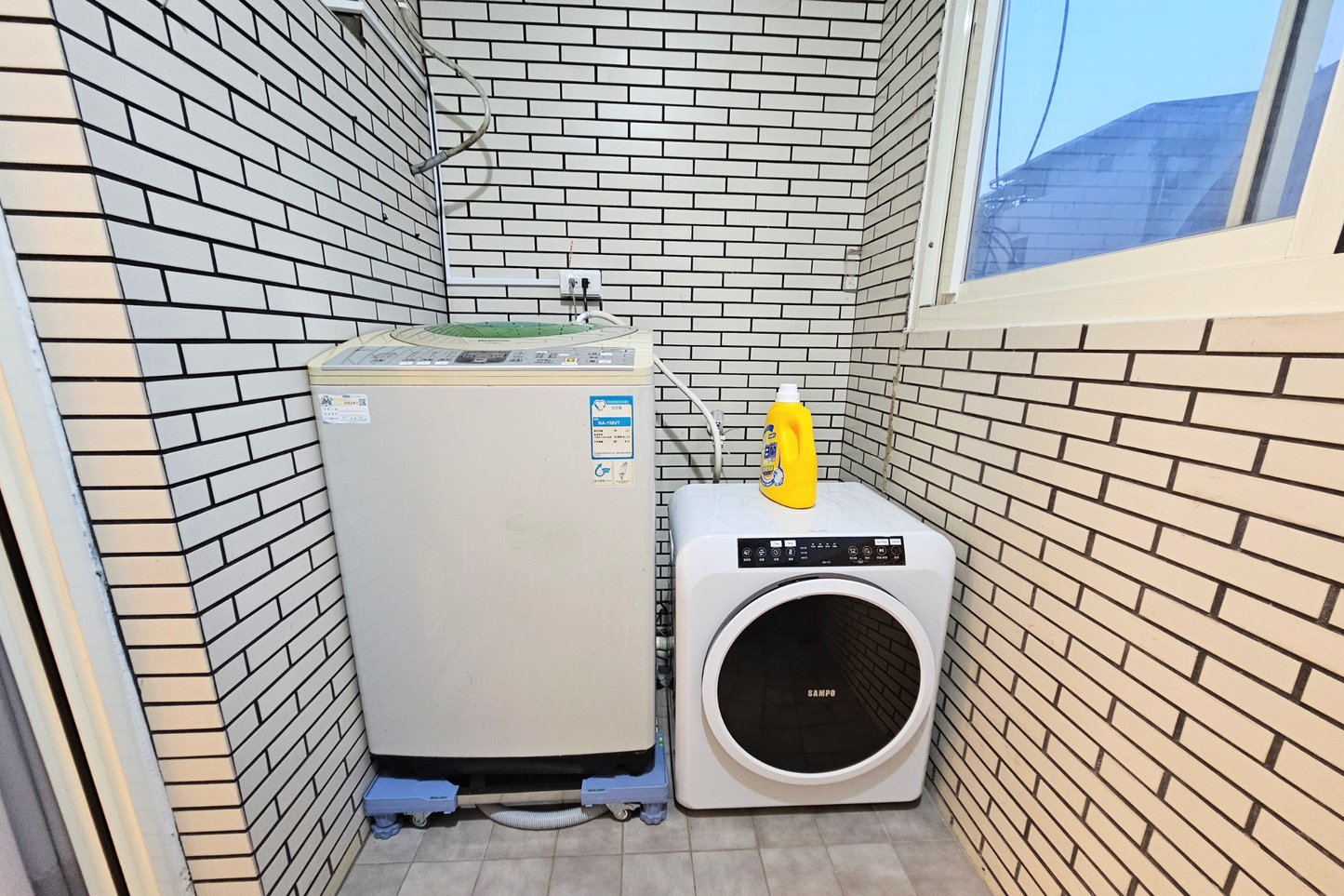 In-unit laundry with washer and dryer in Taipei Taiwan short-term apartment for convenience - Kolette Home