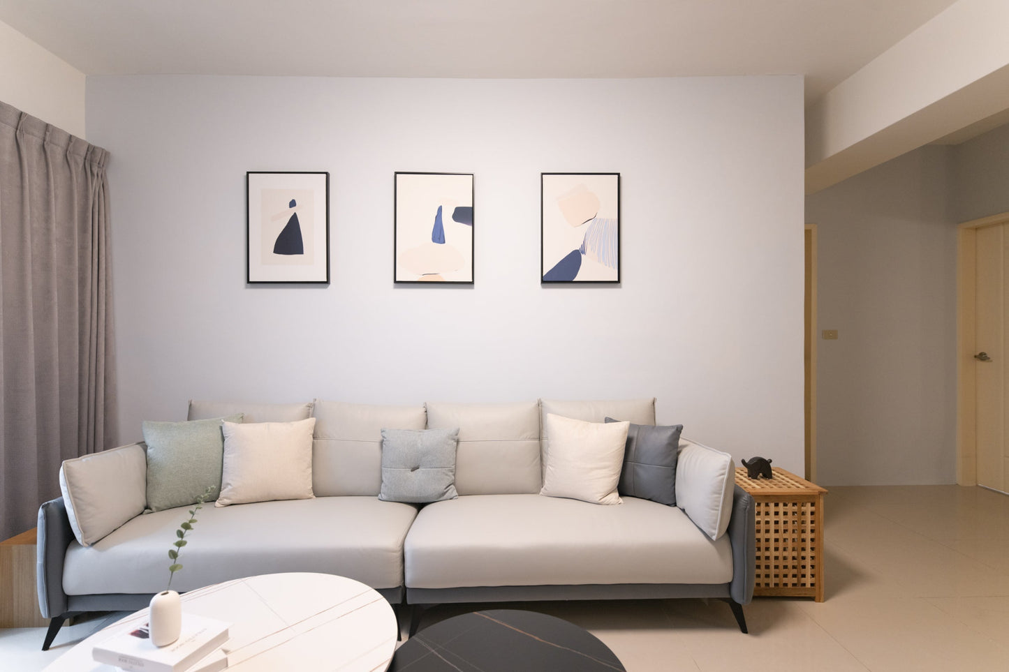 Modern living room in Taipei Taiwan short-term apartment with minimalist design - Kolette Home