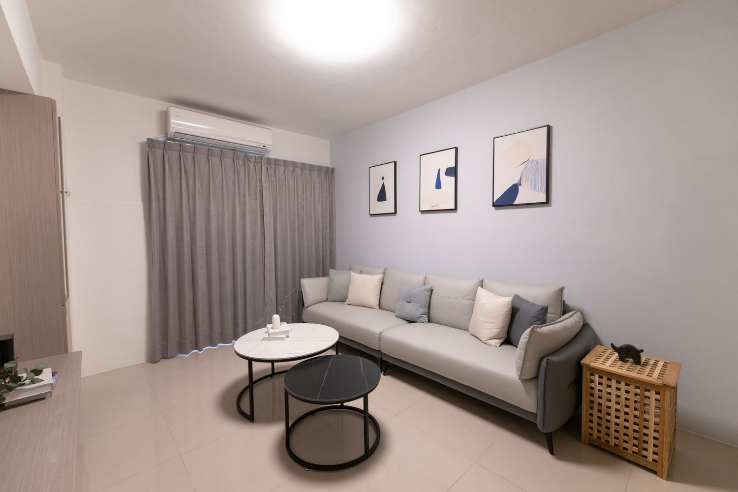 Modern living room in Taipei Taiwan short-term apartment with minimalist design - Kolette Home