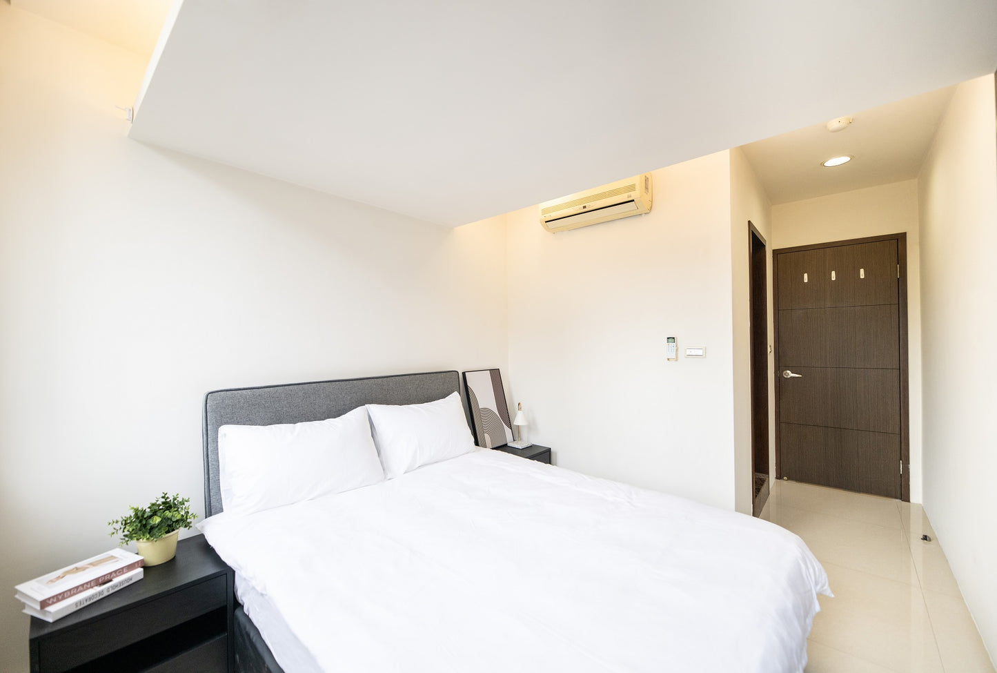 Cozy bedroom in Taipei Taiwan monthly apartment with premium bedding and quiet atmosphere - Kolette Home