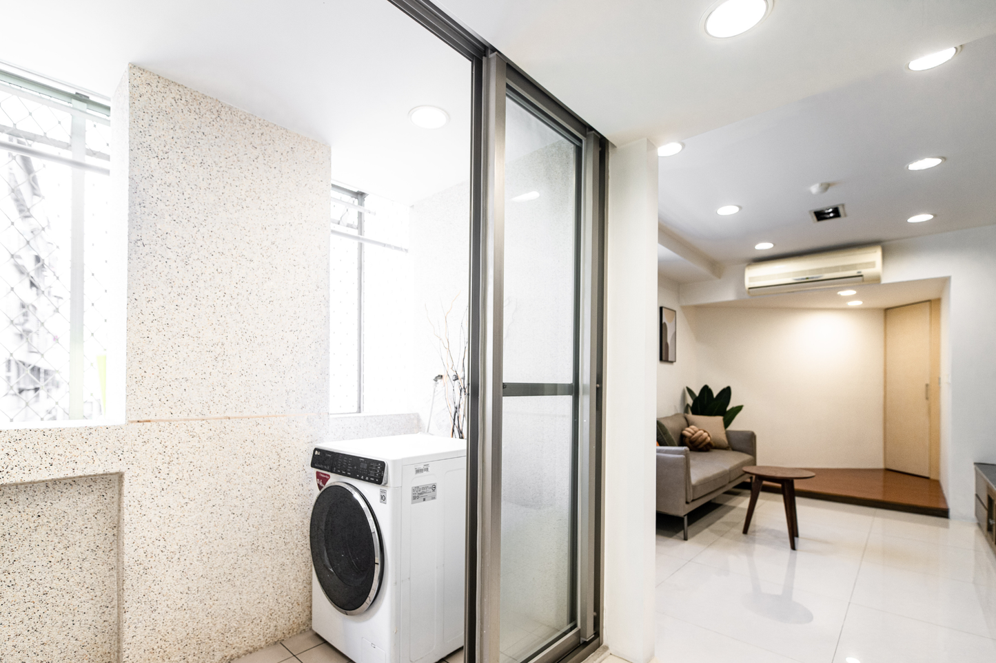 In-unit laundry with washer and dryer in Taipei Taiwan short-term apartment for convenience - Kolette Home