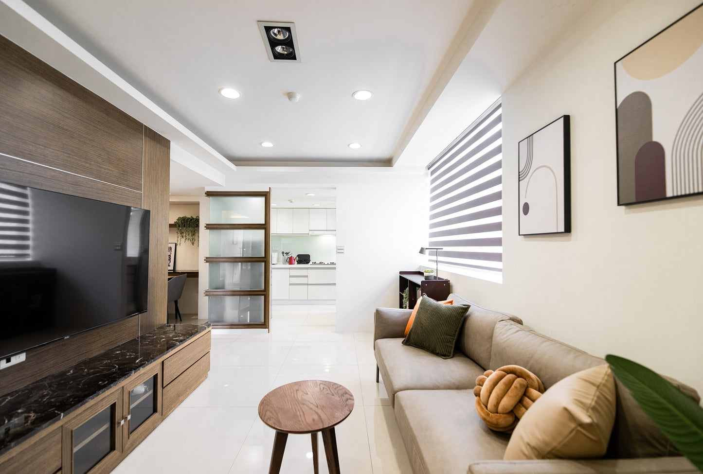 Modern living room in Taipei Taiwan short-term apartment with minimalist design - Kolette Home